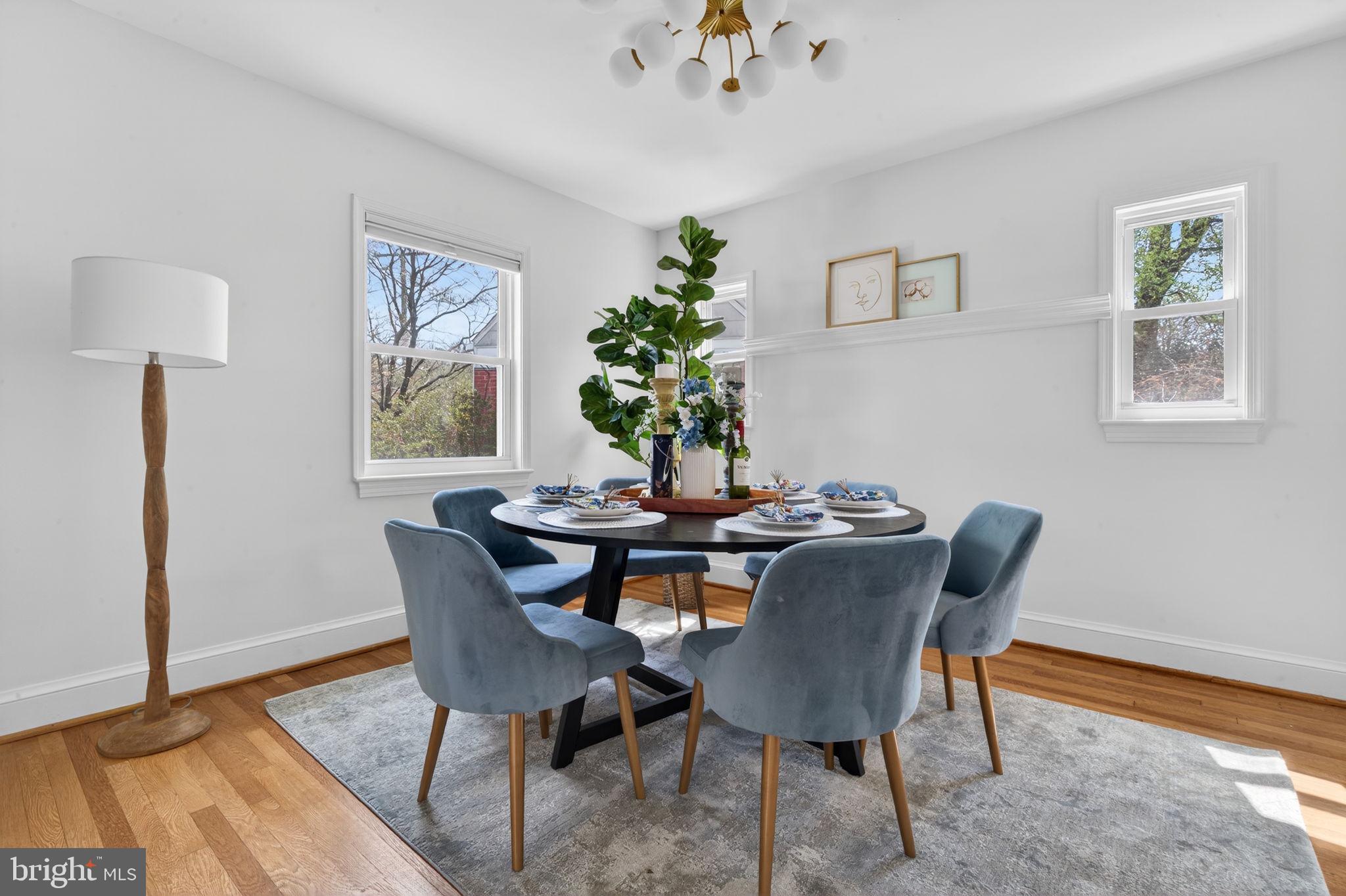 406 Dale Drive Silver Spring, MD 20910 - Photo 14 of 60 a view of a dining room with furniture and wooden floor