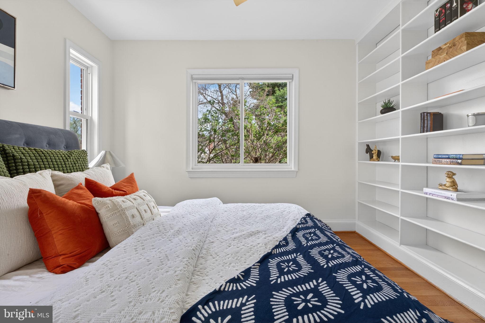 406 Dale Drive Silver Spring, MD 20910 - Photo 26 of 60 a bedroom with a bed and a window