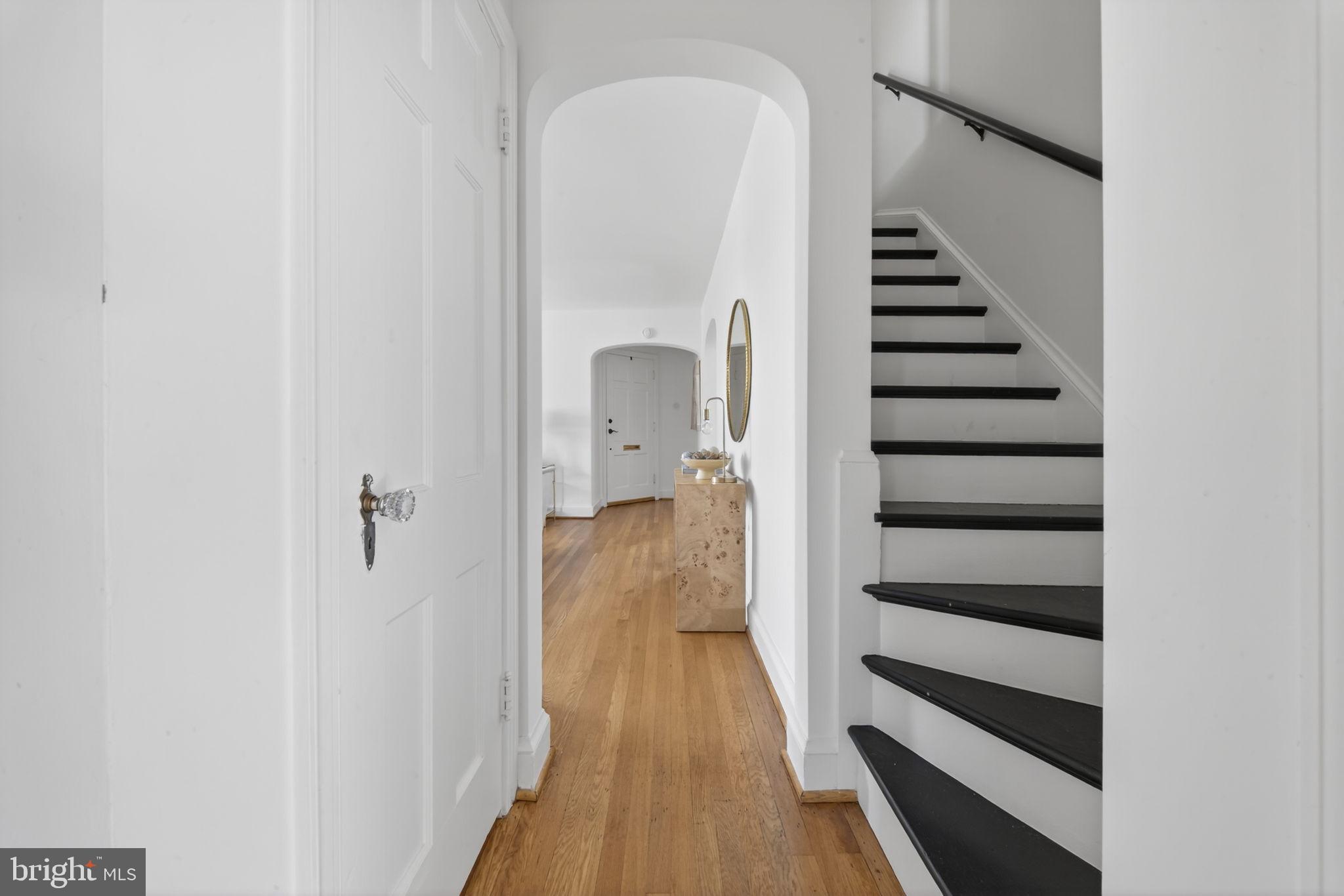 406 Dale Drive Silver Spring, MD 20910 - Photo 29 of 60 a view of a hallway with wooden floor and entryway