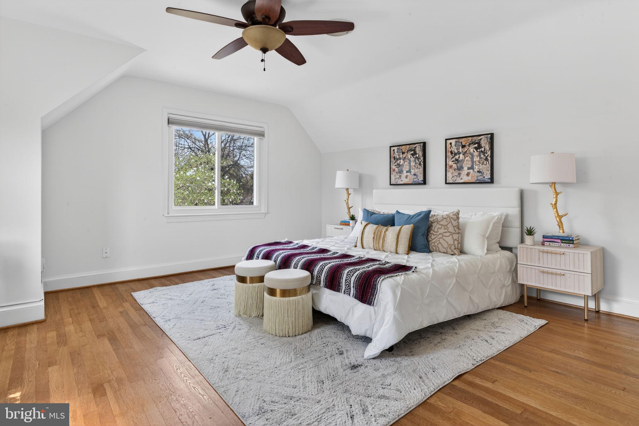 406 Dale Drive Silver Spring, MD 20910 - Photo 30 of 60 a spacious bedroom with a bed and window