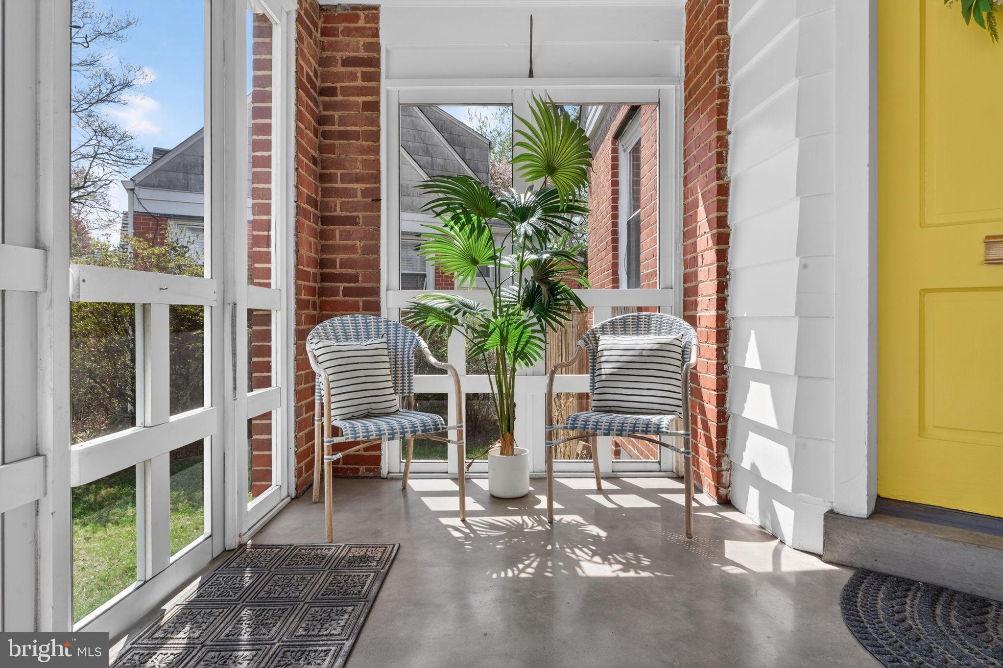 406 Dale Drive Silver Spring, MD 20910 - Photo 7 of 60 a view of balcony with two chairs and a potted plant