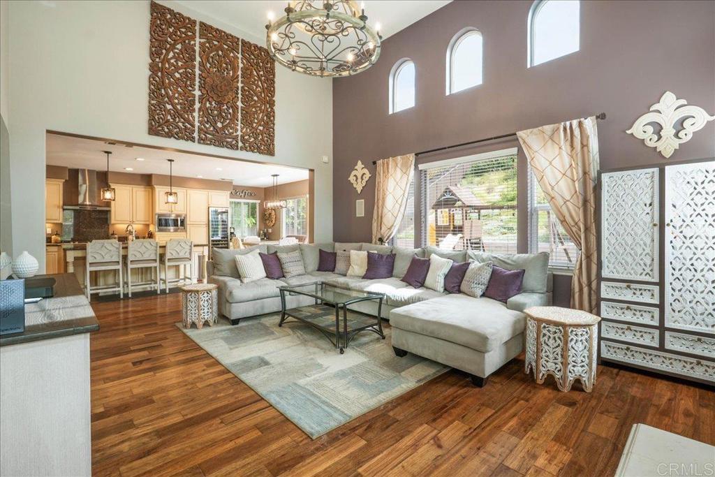 6996 Goldstone Road Carlsbad, CA 92009 - Photo 18 of 49 a living room with furniture and a large window