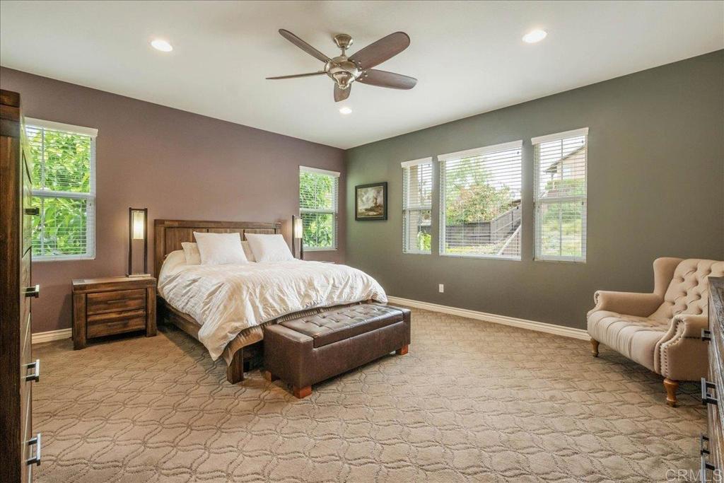 6996 Goldstone Road Carlsbad, CA 92009 - Photo 26 of 49 a bedroom with a bed and window