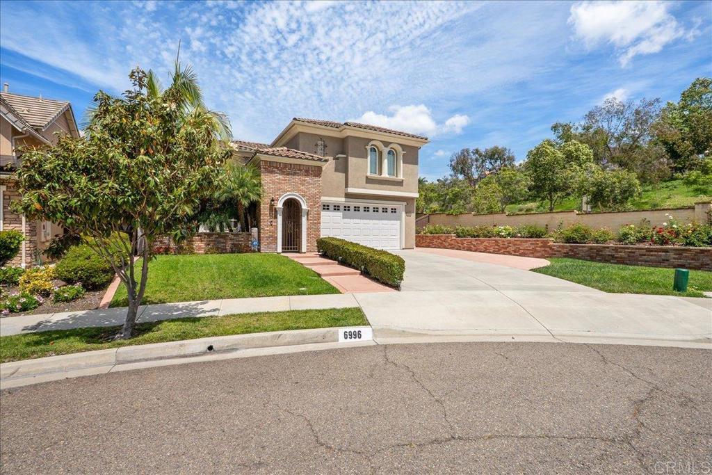 6996 Goldstone Road Carlsbad, CA 92009 - Photo 47 of 49 a view of a street with a building in the background