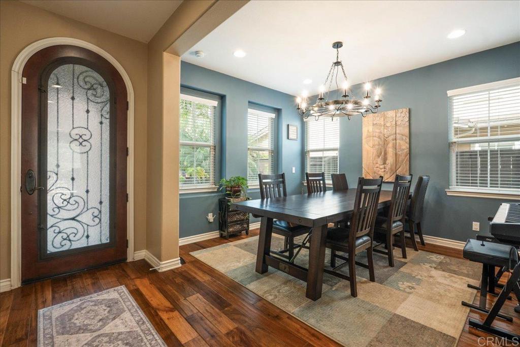 6996 Goldstone Road Carlsbad, CA 92009 - Photo 5 of 49 a view of a dining room with furniture and window