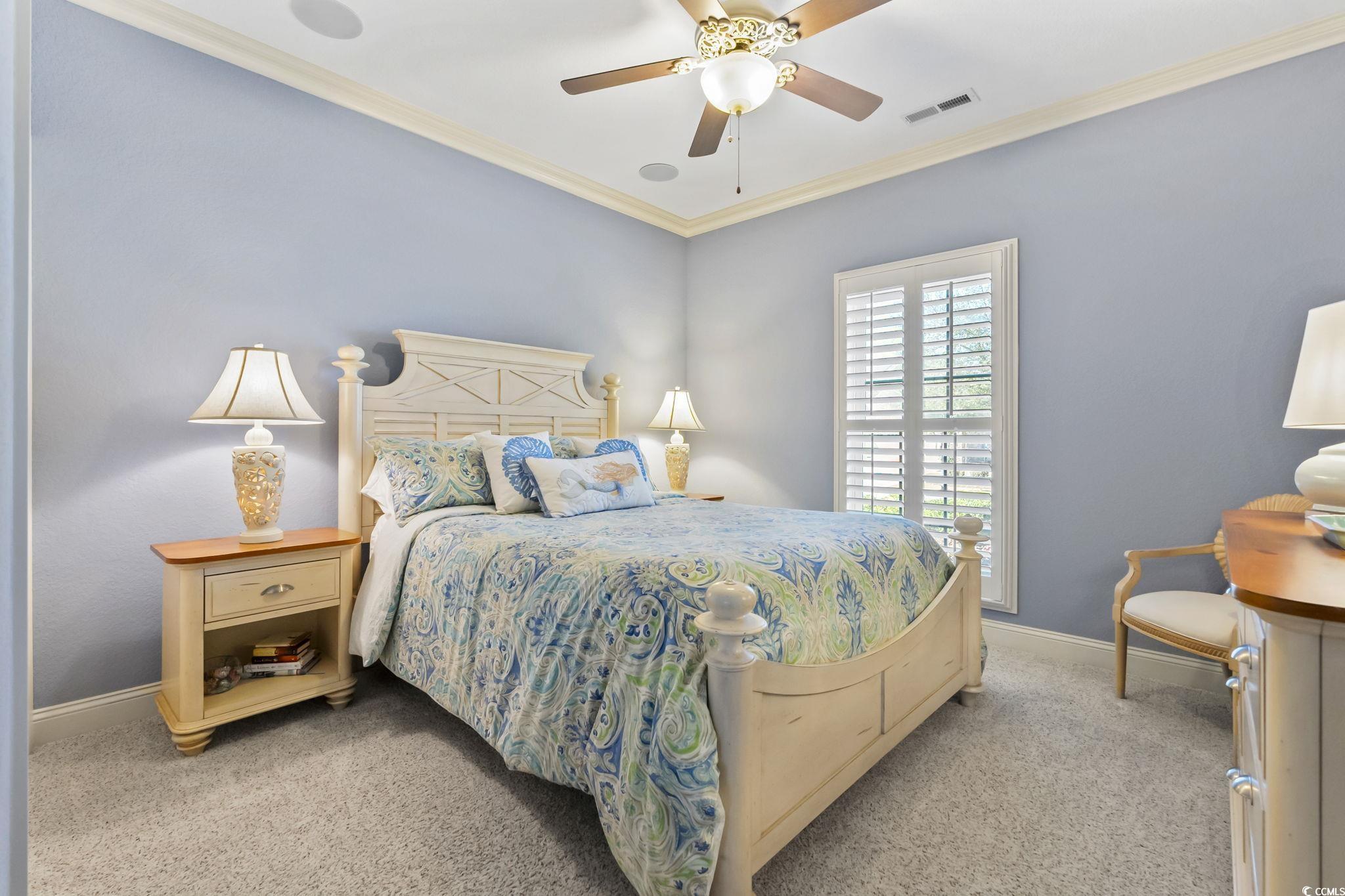 750 Villarosa Drive Myrtle Beach, SC 29572 - Photo 21 of 40 Bedroom with carpet flooring, ceiling fan, and ornamental molding