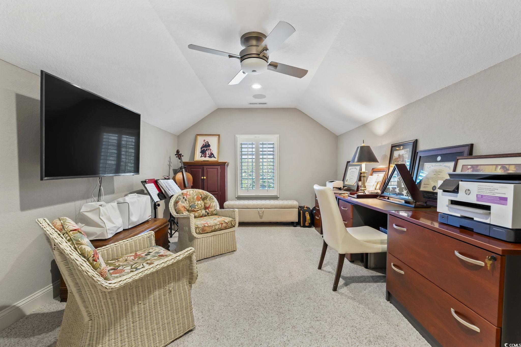 750 Villarosa Drive Myrtle Beach, SC 29572 - Photo 25 of 40 Home office featuring vaulted ceiling, a ceiling fan, and light colored carpet