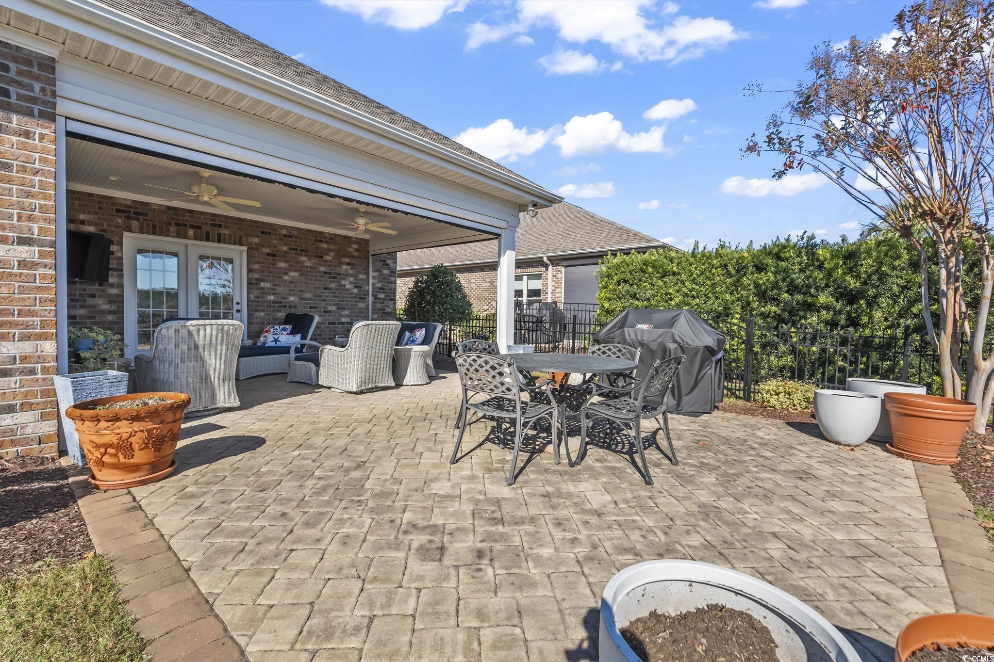 750 Villarosa Drive Myrtle Beach, SC 29572 - Photo 32 of 40 View of patio / terrace featuring outdoor lounge area, ceiling fan, grilling area, outdoor dining area, and french doors