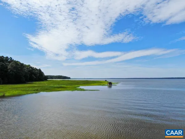 a view of a big yard with an outdoor space