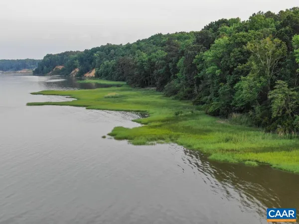 a view of a garden with a building