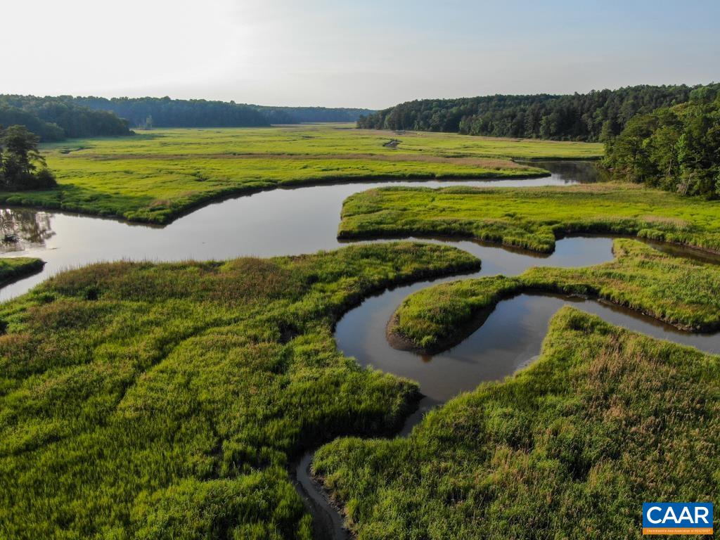 A Ware Creek Road Williamsburg, VA 23188 - Photo 5 of 25 a view of a lake with a beach