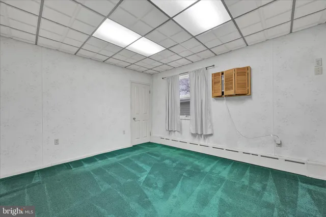 a view of an empty room and window