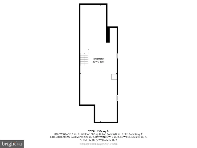 a picture of a room with a white wall and white refrigerator