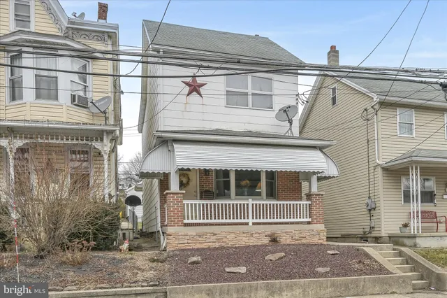 a view of a livingroom with couch