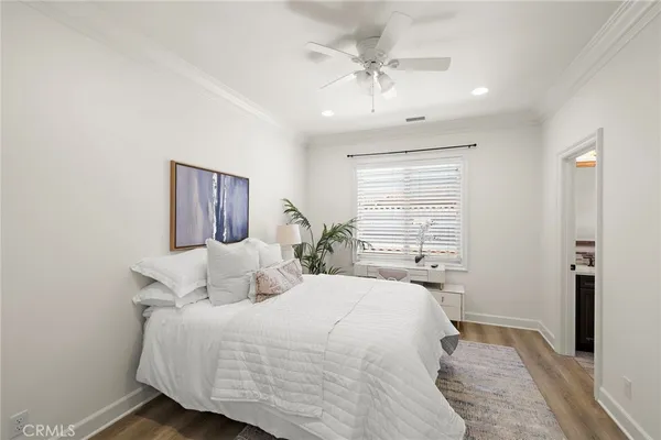 a bathroom with a sink toilet and mirror