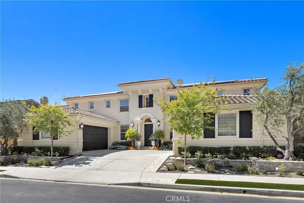 a view of a house with a street