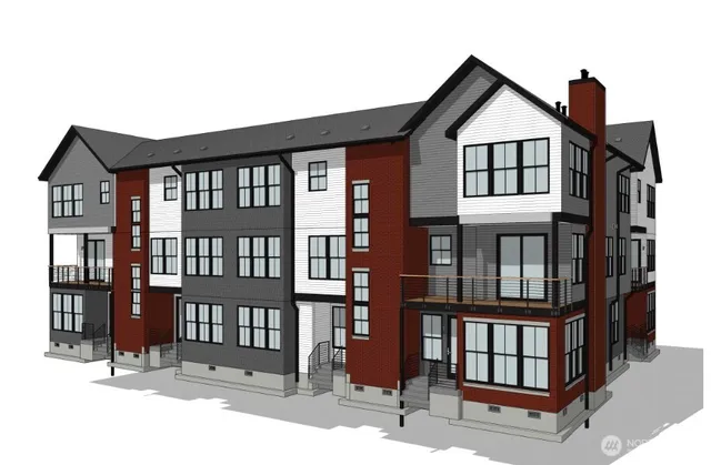 a view of a brick house with large windows