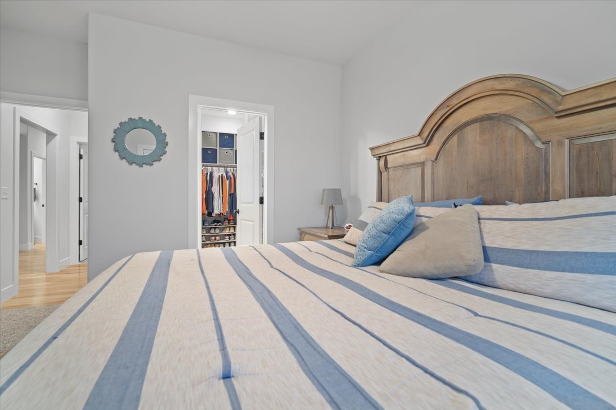 1911 Glenbridge Road Bloomington, IL 61704 - Photo 15 of 36 a bedroom with bed and a more windows