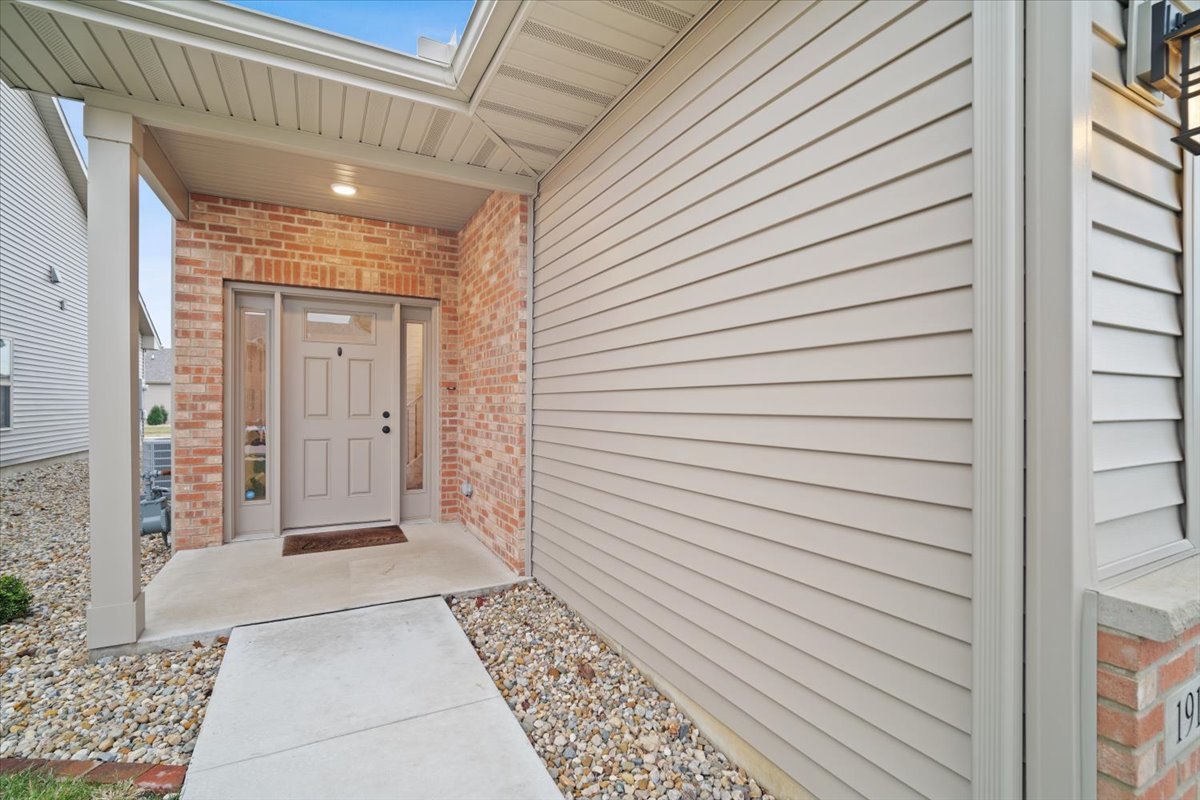 1911 Glenbridge Road Bloomington, IL 61704 - Photo 3 of 36 a view of a entryway door of the house