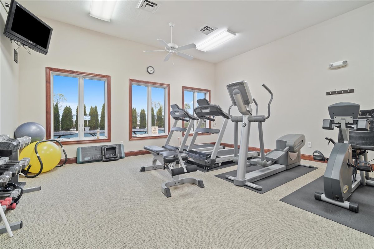 1911 Glenbridge Road Bloomington, IL 61704 - Photo 32 of 36 a view of a room with gym equipment