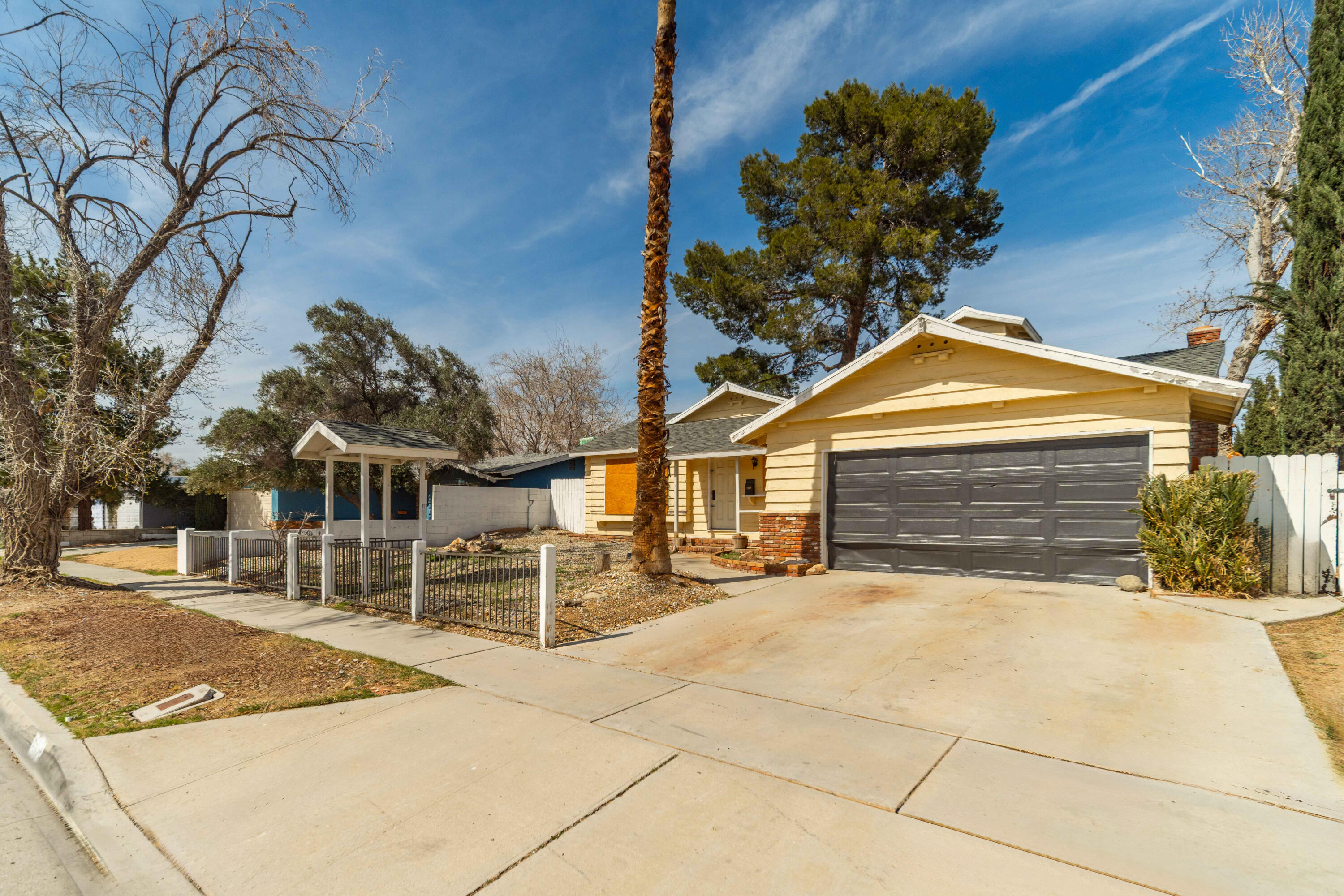 621 Ave J E Lancaster Ca East Lancaster, CA 93535 - Photo 2 of 25 a view of a house with a snow