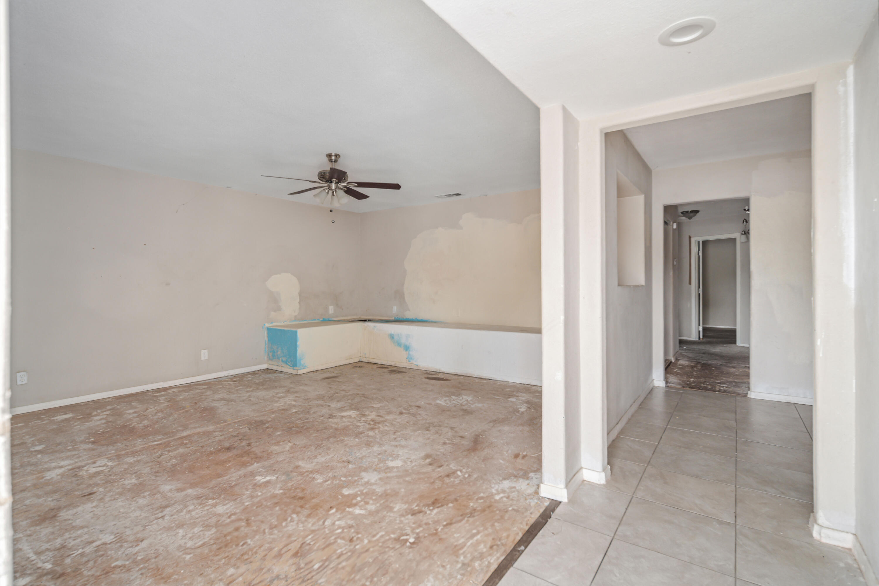 621 Ave J E Lancaster Ca East Lancaster, CA 93535 - Photo 5 of 25 a view of a room with a hallway