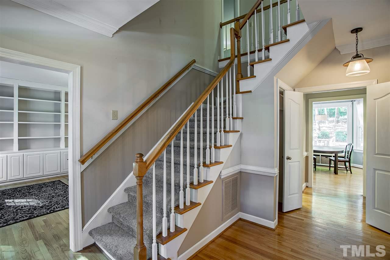 11503 South Lowell Road Bahama, NC 27503 - Photo 3 of 30 This bright entry hall welcomes your friends & family from the covered front porch. Hardwood floors and new carpet throughout the first floor. Dining Room to the right, and flex space to the left.