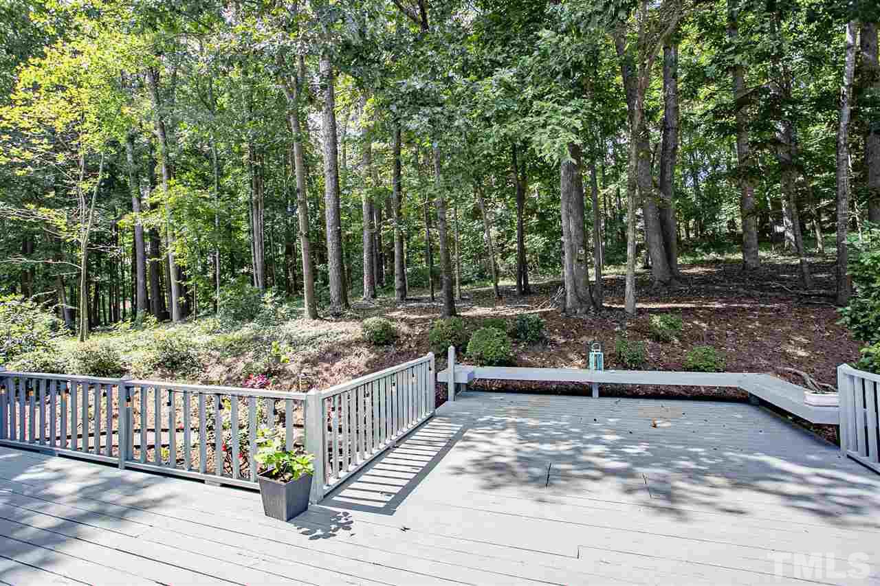 11503 South Lowell Road Bahama, NC 27503 - Photo 23 of 30 Lovely wooded backyard for playing, exploring or relaxing in the hammock.