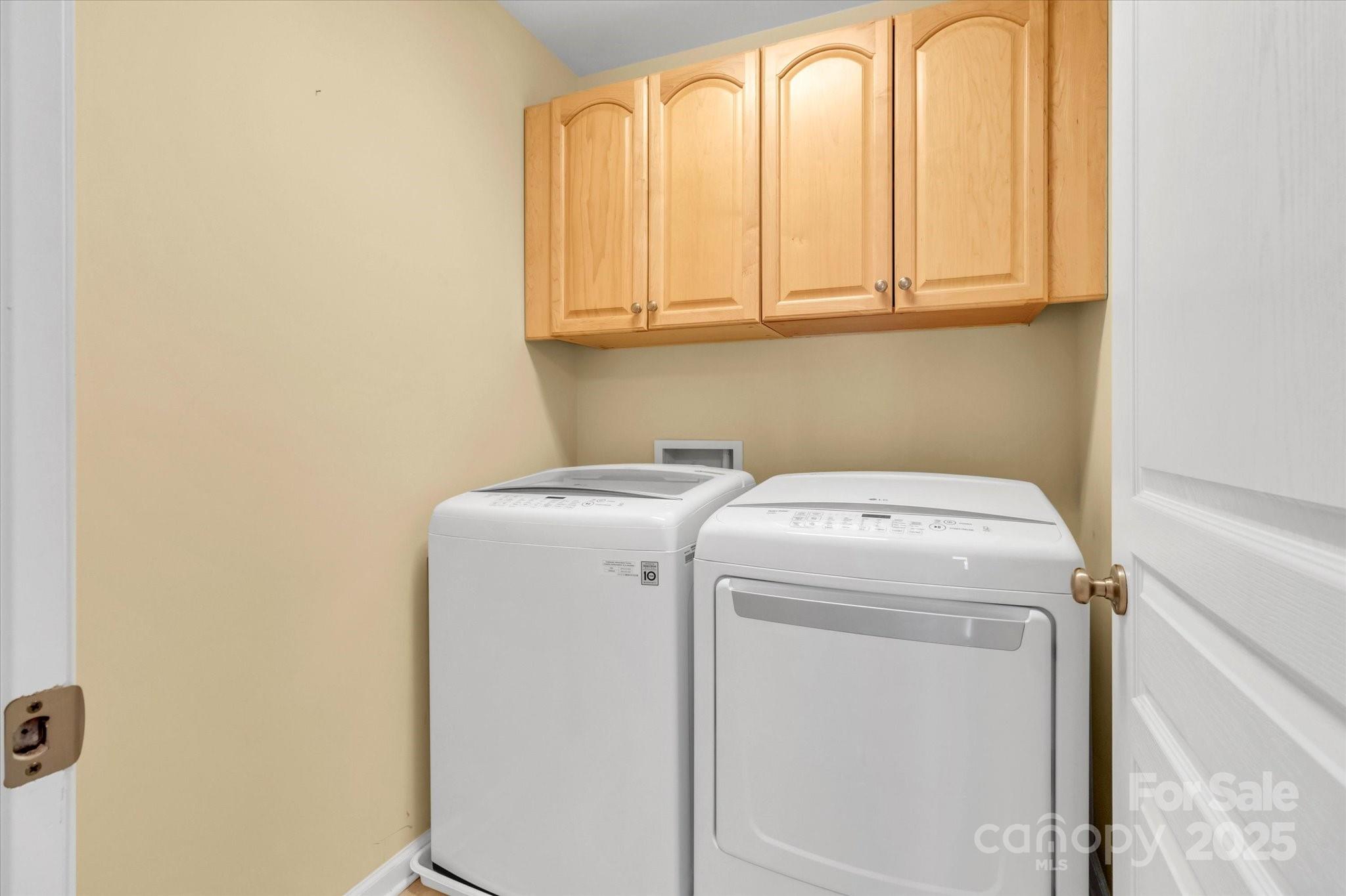 297 Sand Paver Way Fort Mill, SC 29708 - Photo 33 of 39 a utility room with dryer and washer