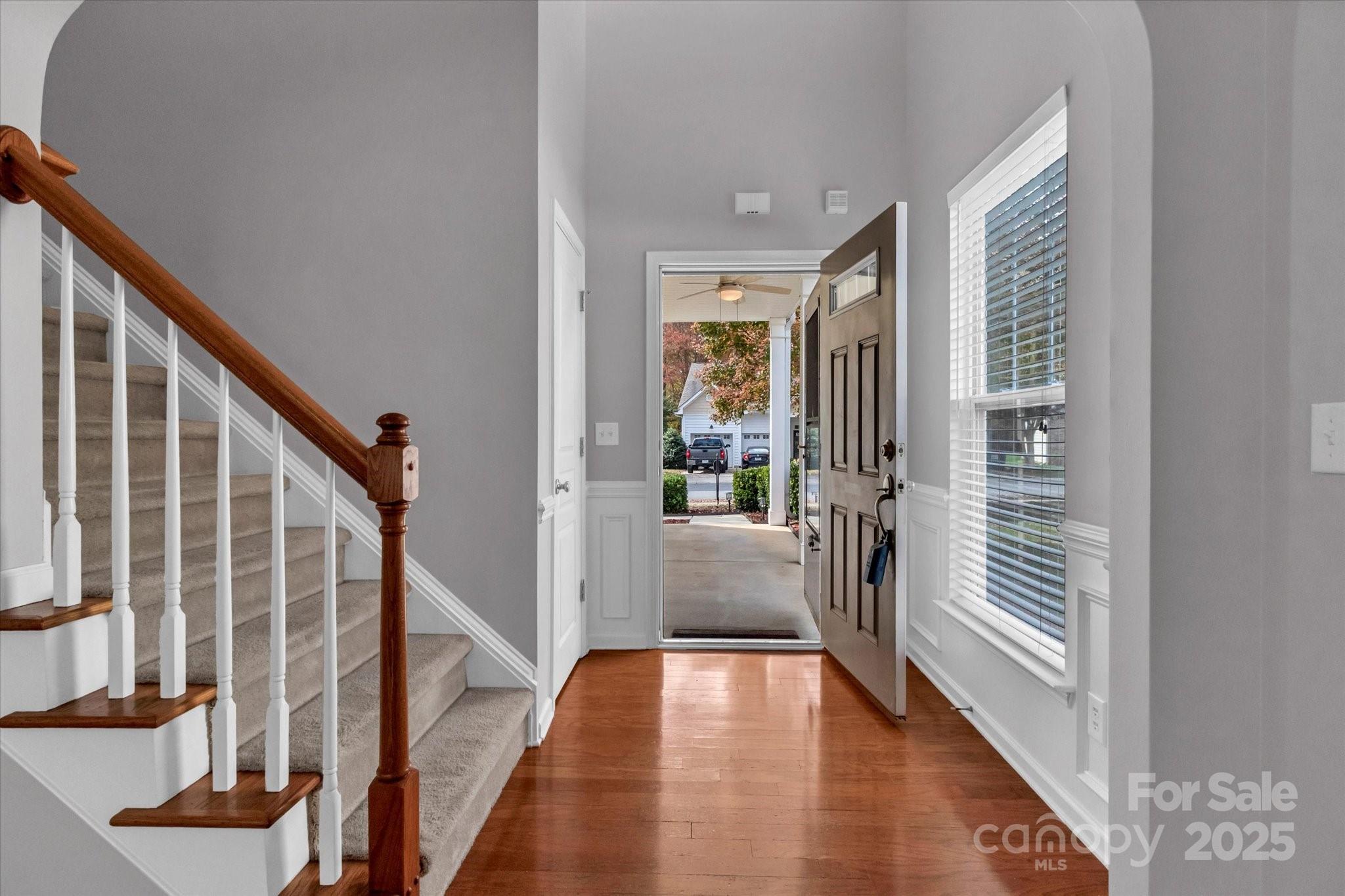 297 Sand Paver Way Fort Mill, SC 29708 - Photo 8 of 39 a view of an entryway with wooden floor and windows