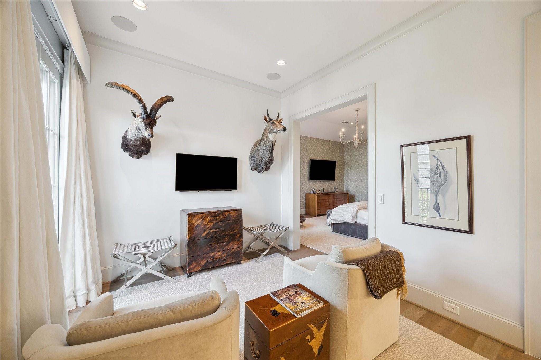 6218 Burgoyne Road Houston, TX 77057 - Photo 27 of 43 a living room with furniture and a flat screen tv