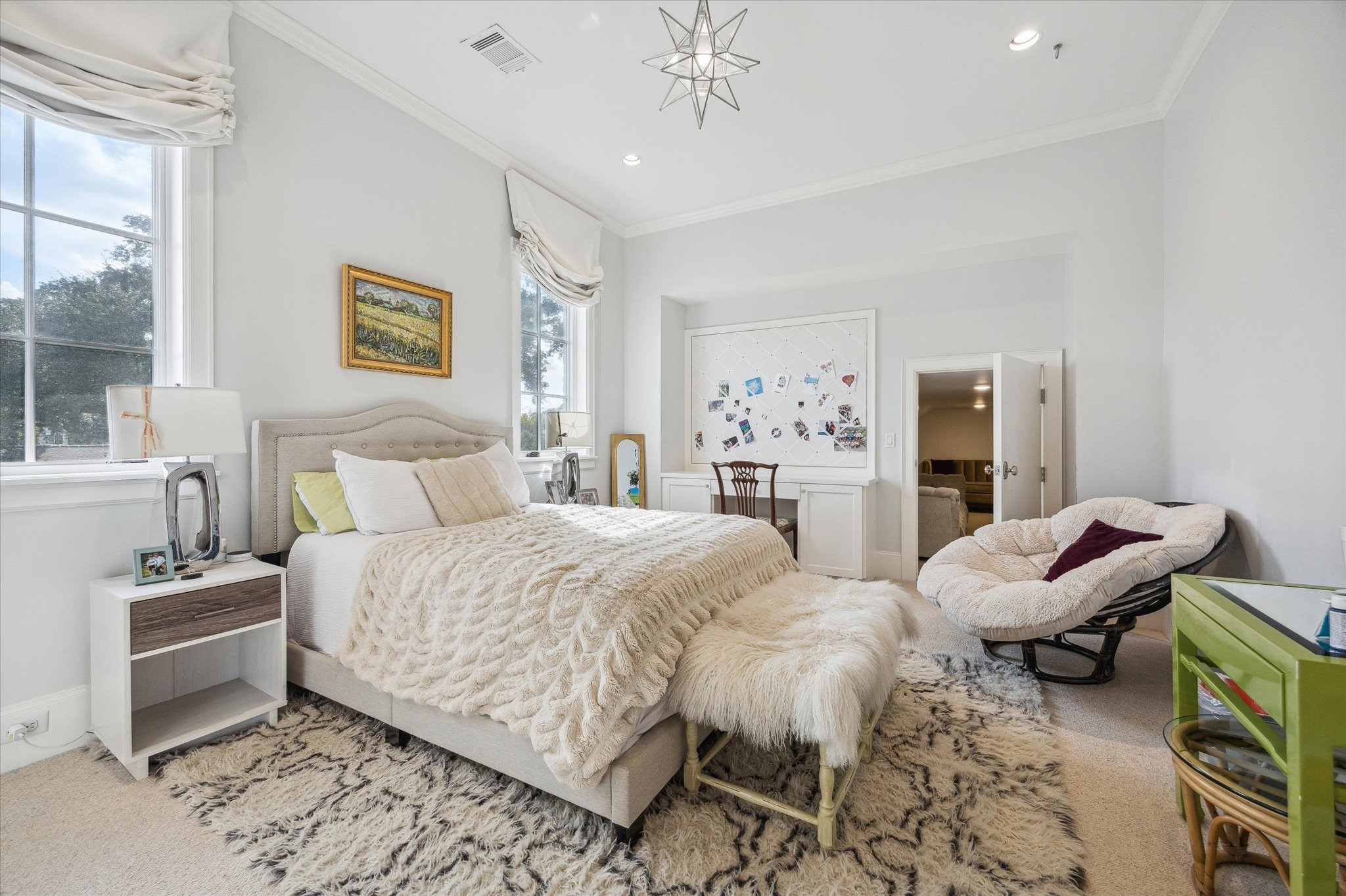 6218 Burgoyne Road Houston, TX 77057 - Photo 31 of 43 a bedroom with a bed and furniture