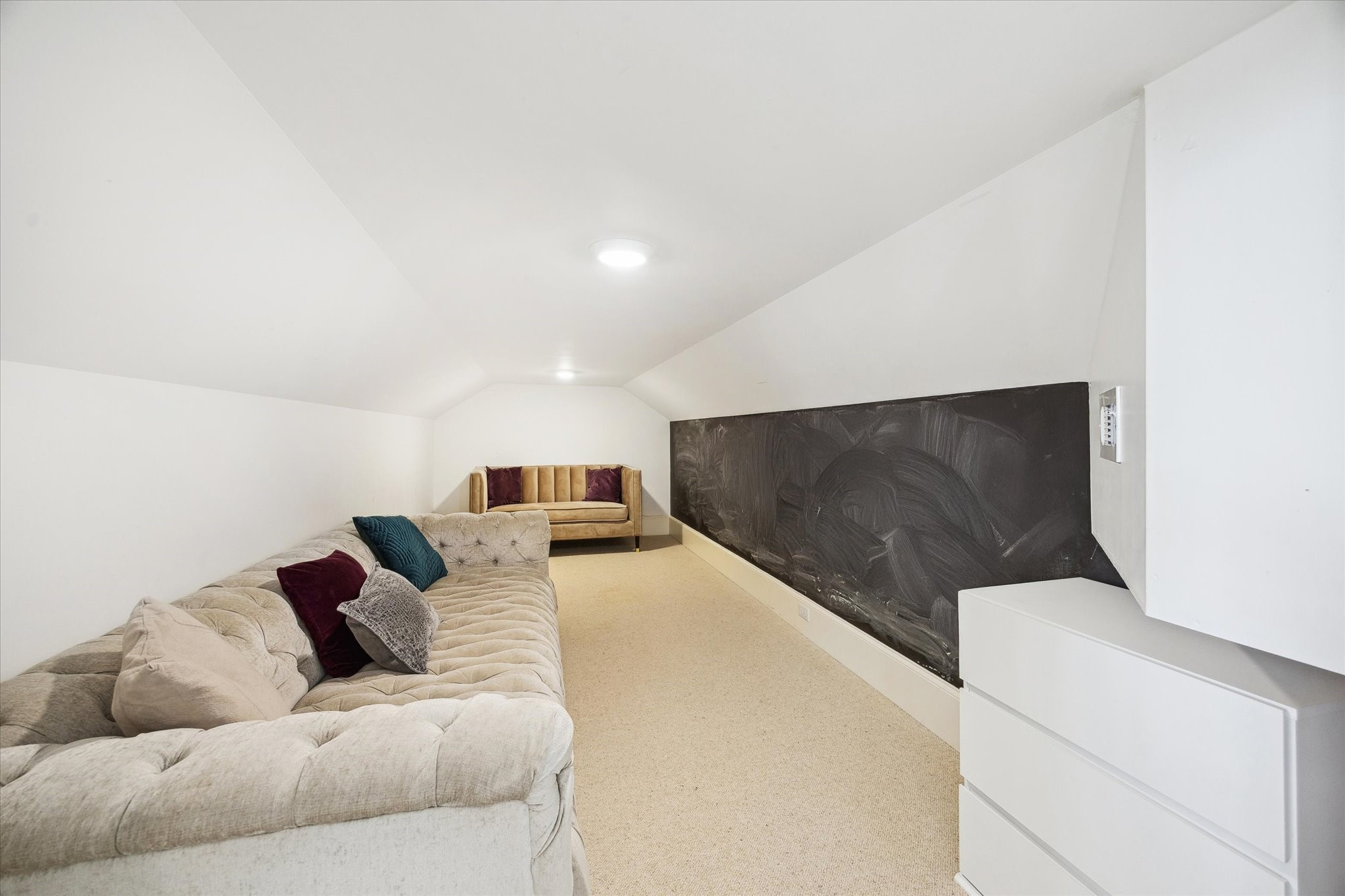 6218 Burgoyne Road Houston, TX 77057 - Photo 32 of 43 a living room with furniture and a flat screen tv