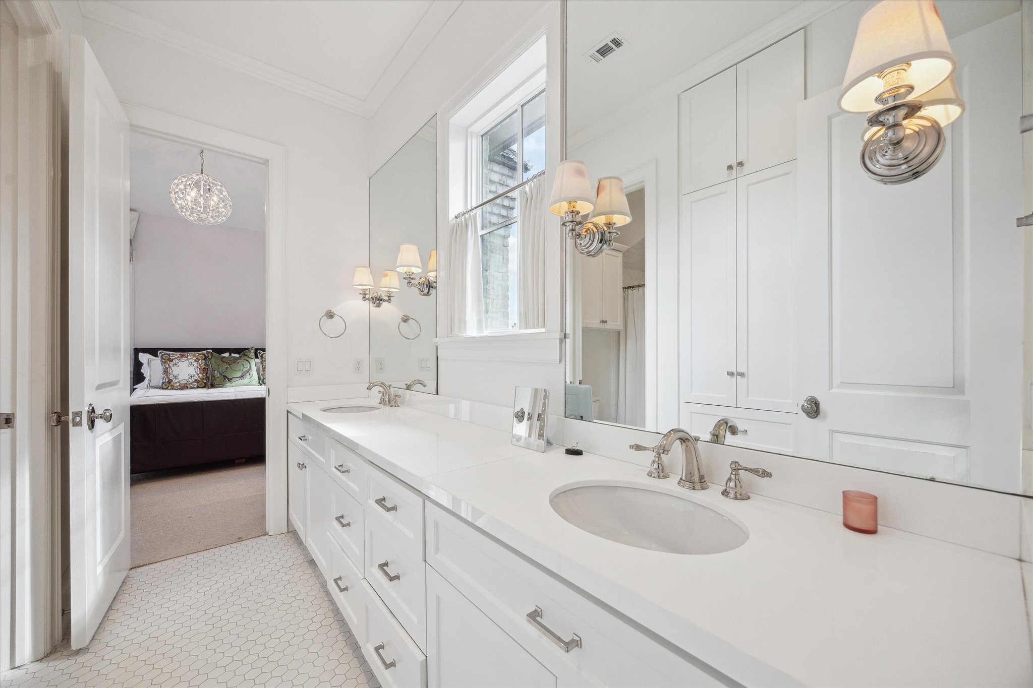6218 Burgoyne Road Houston, TX 77057 - Photo 35 of 43 a spacious bathroom with a double vanity sink and a mirror