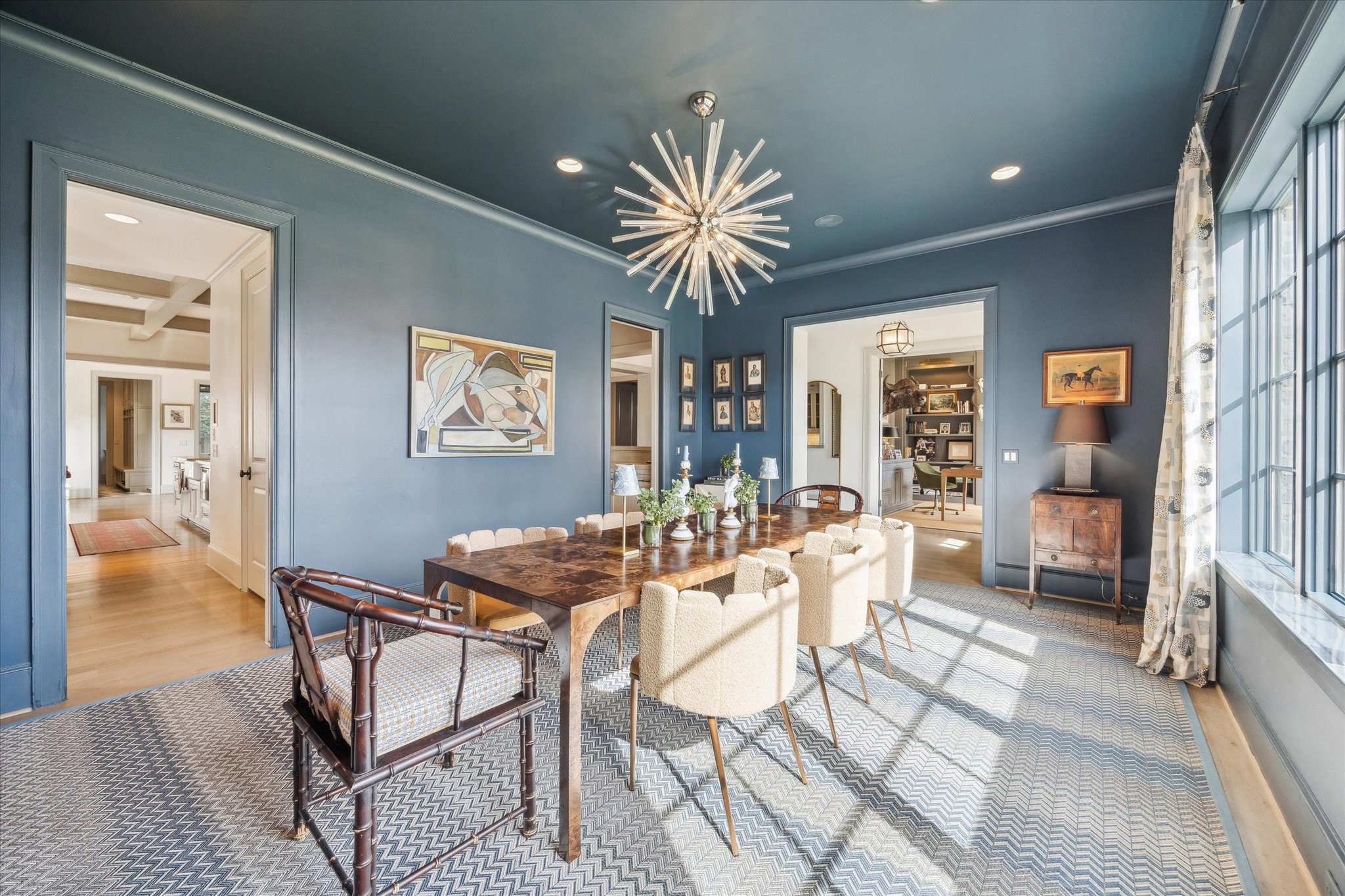 6218 Burgoyne Road Houston, TX 77057 - Photo 7 of 43 a dining room with furniture and chandelier