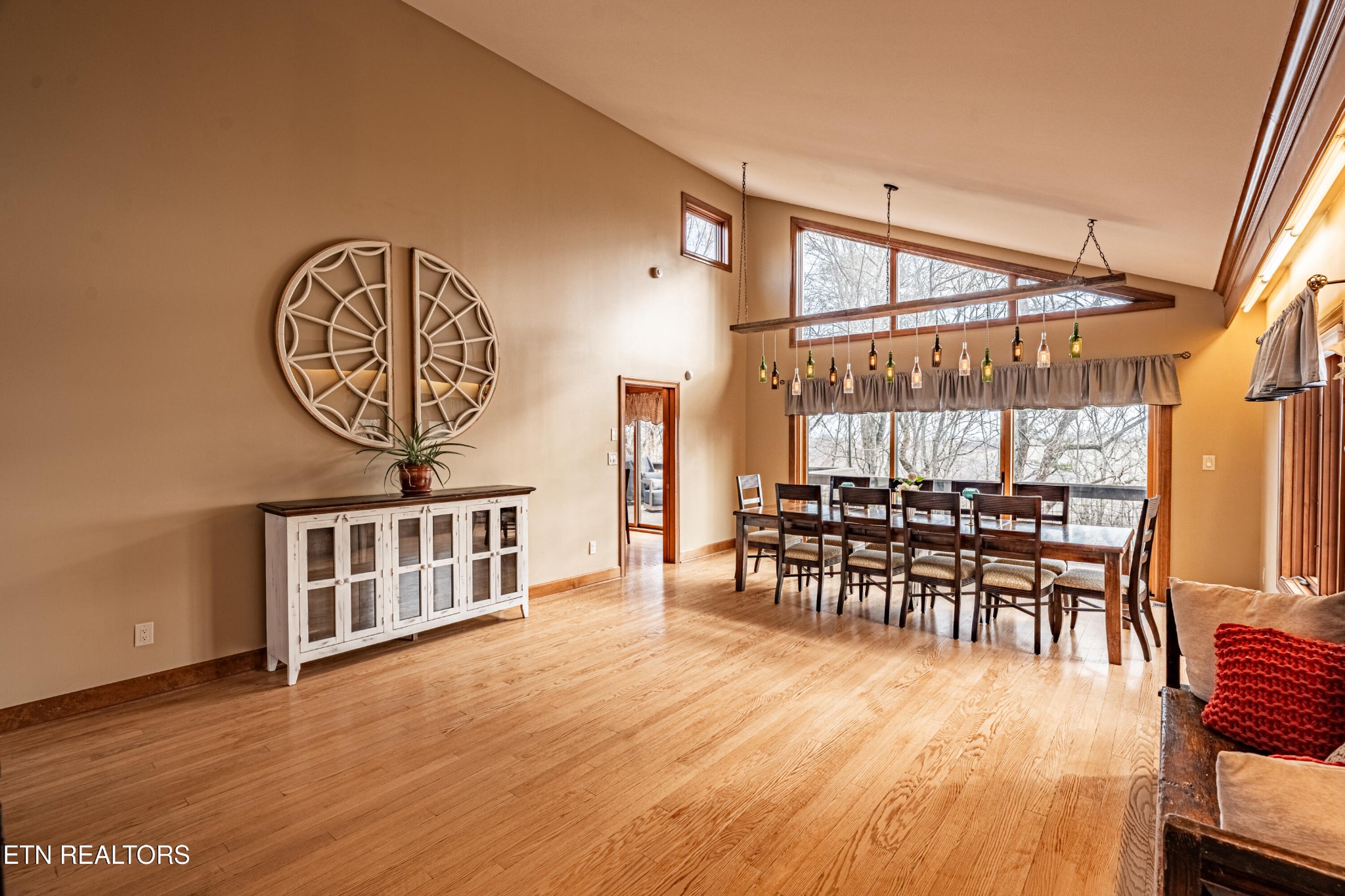 11104 Poplar Ridge Road Knoxville, TN 37932 - Photo 12 of 53 a view of a dining room with furniture window and wooden floor