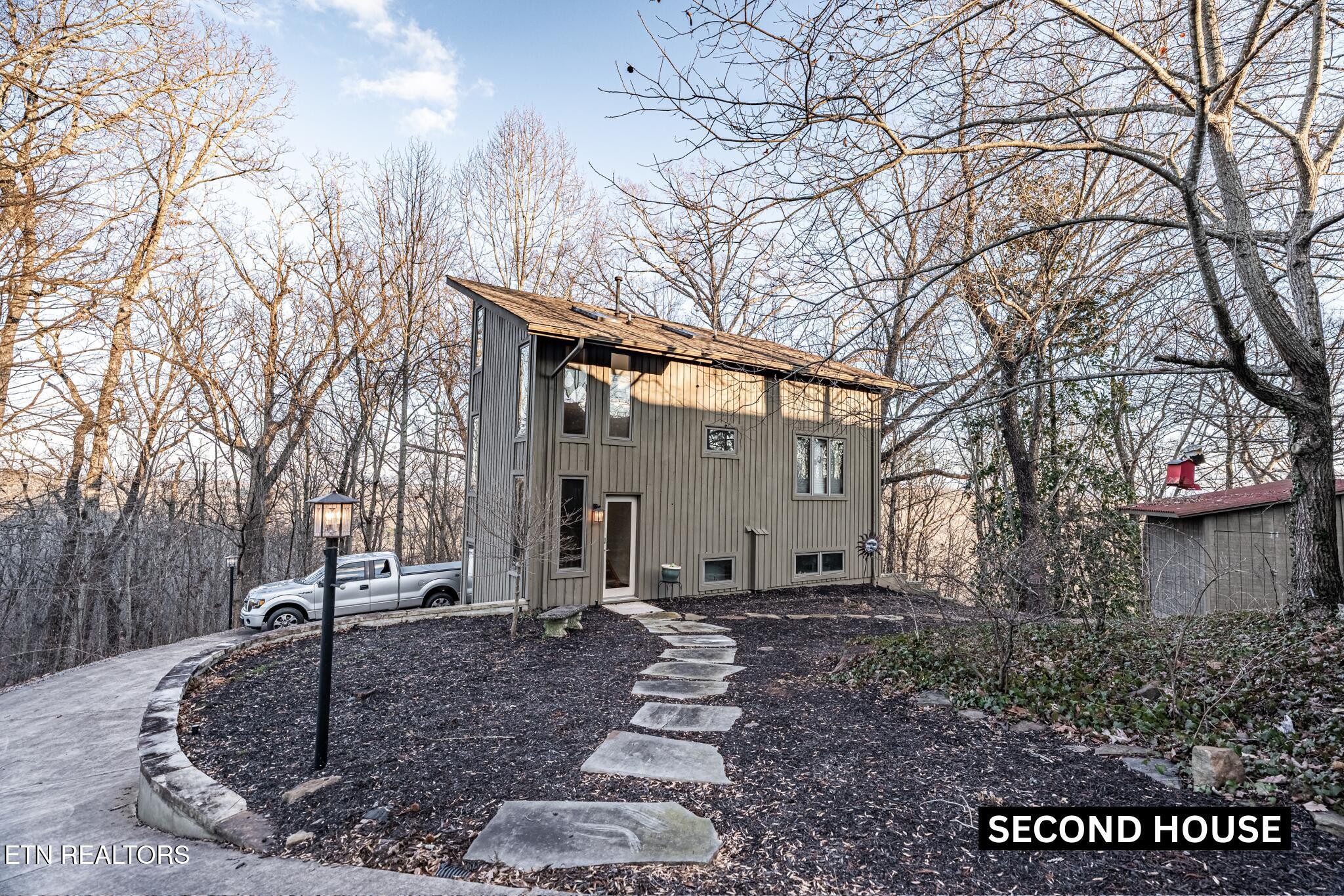 11104 Poplar Ridge Road Knoxville, TN 37932 - Photo 2 of 53 a view of a house with a yard