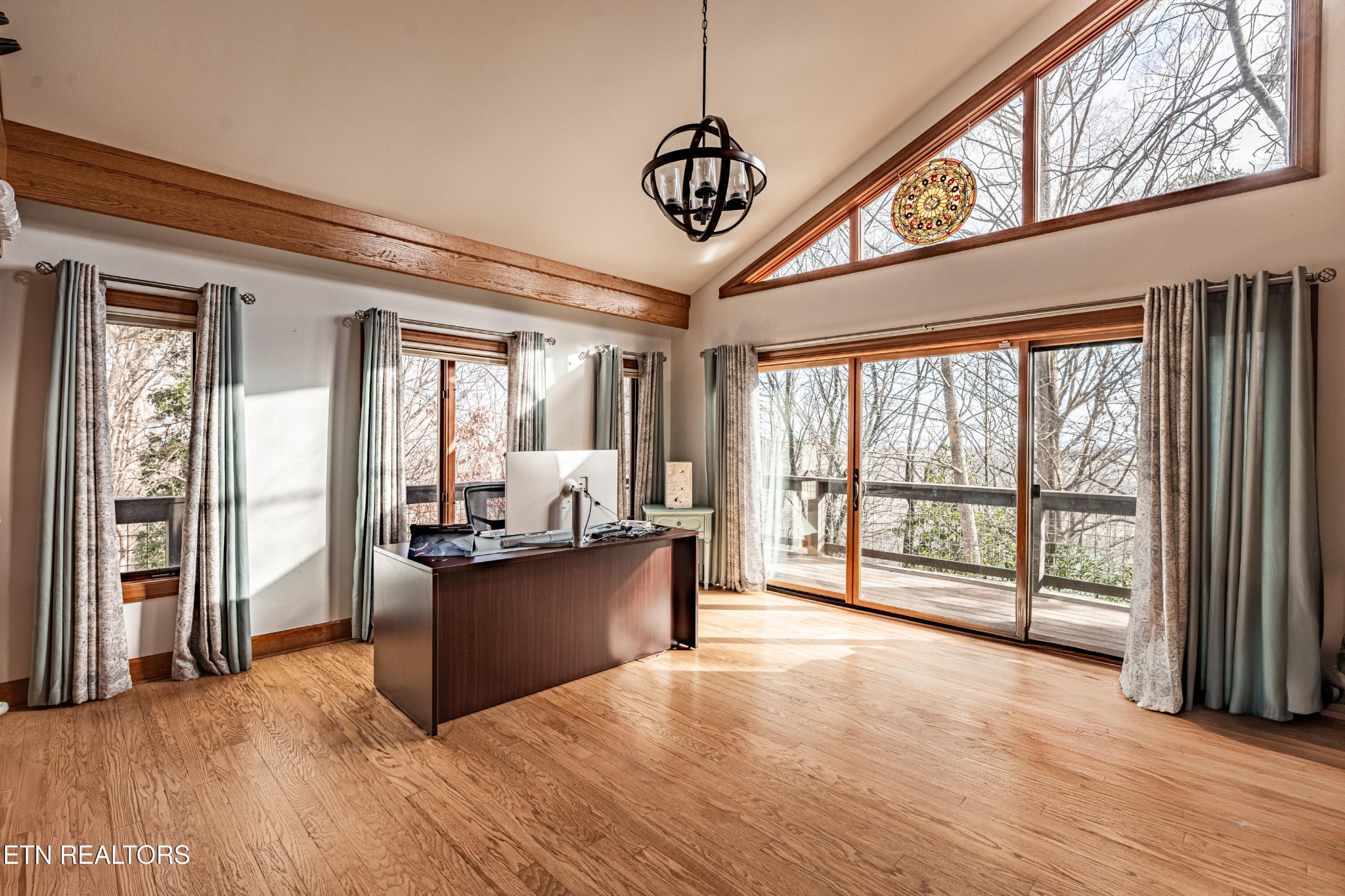 11104 Poplar Ridge Road Knoxville, TN 37932 - Photo 24 of 53 a view of a room with wooden floor and furniture