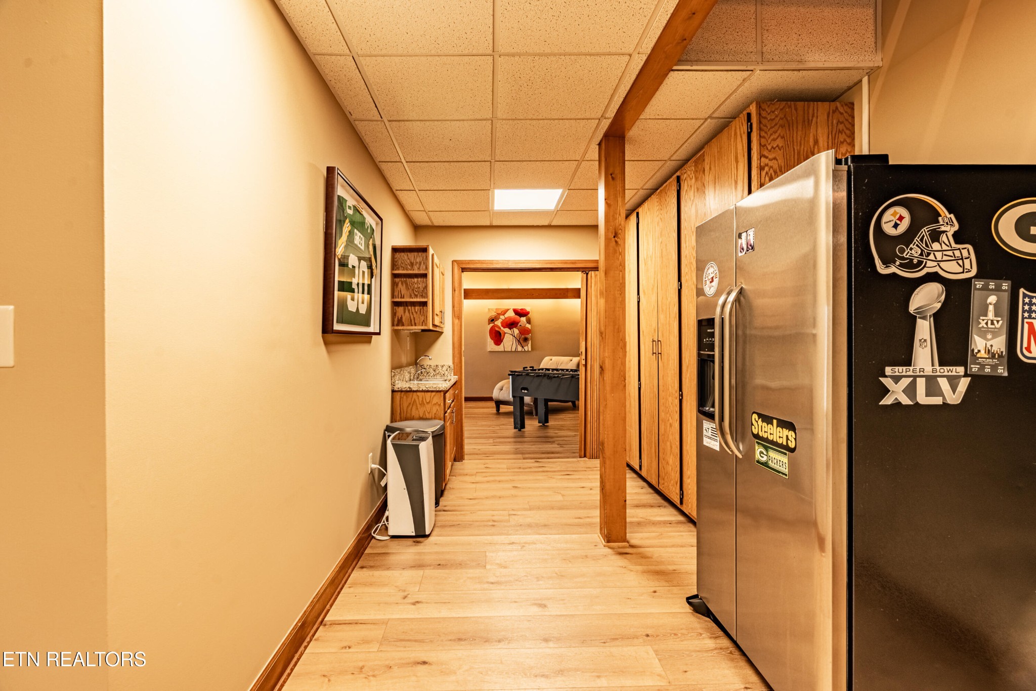 11104 Poplar Ridge Road Knoxville, TN 37932 - Photo 28 of 53 a view of a hallway with wooden floor and dining room