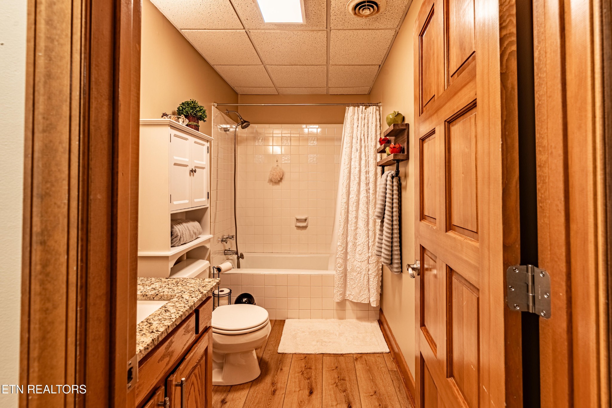 11104 Poplar Ridge Road Knoxville, TN 37932 - Photo 30 of 53 a bathroom with a toilet a sink and shower