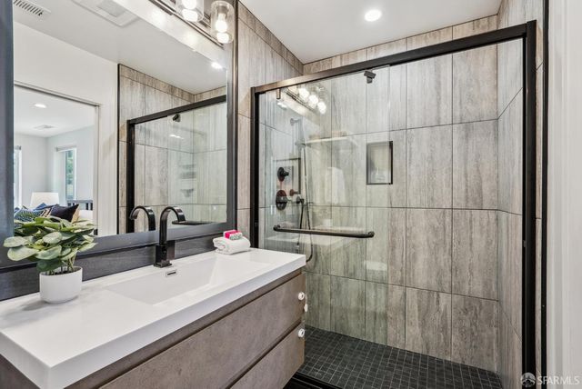 a bed room with a bed and a window