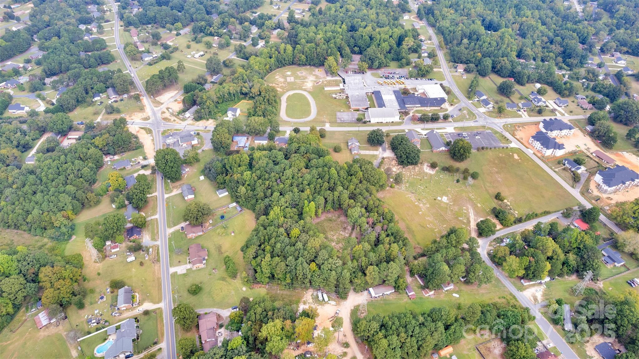 0 West Ridge Avenue Landis, NC 28088 - Photo 6 of 16 a view of a yard with yellow house