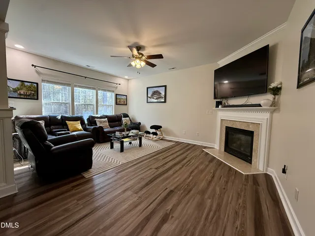 a kitchen with stainless steel appliances granite countertop a refrigerator stove and oven