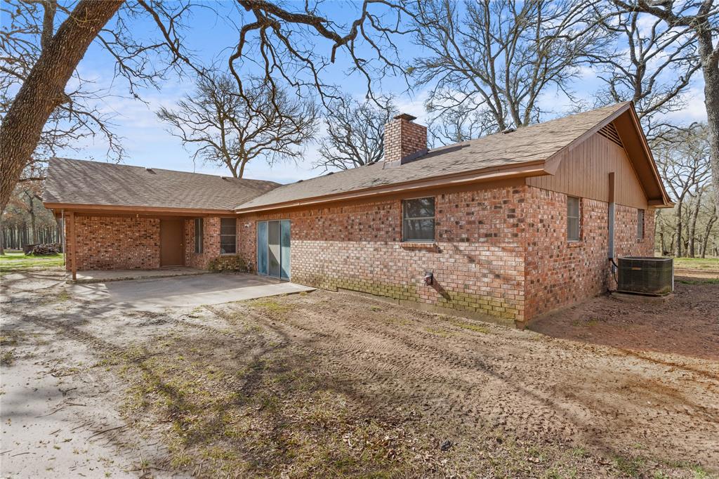 1447 Red Gate Road Mart, TX 76664 - Photo 22 of 38 a view of a house with a snow in the yard