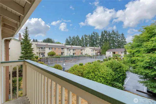 a view of a lake from a balcony