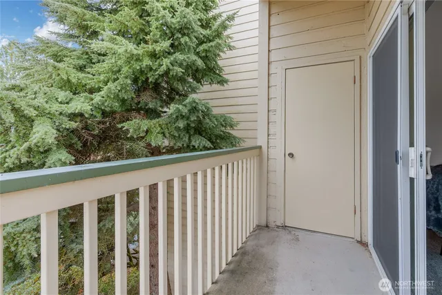 a view of a balcony with city view