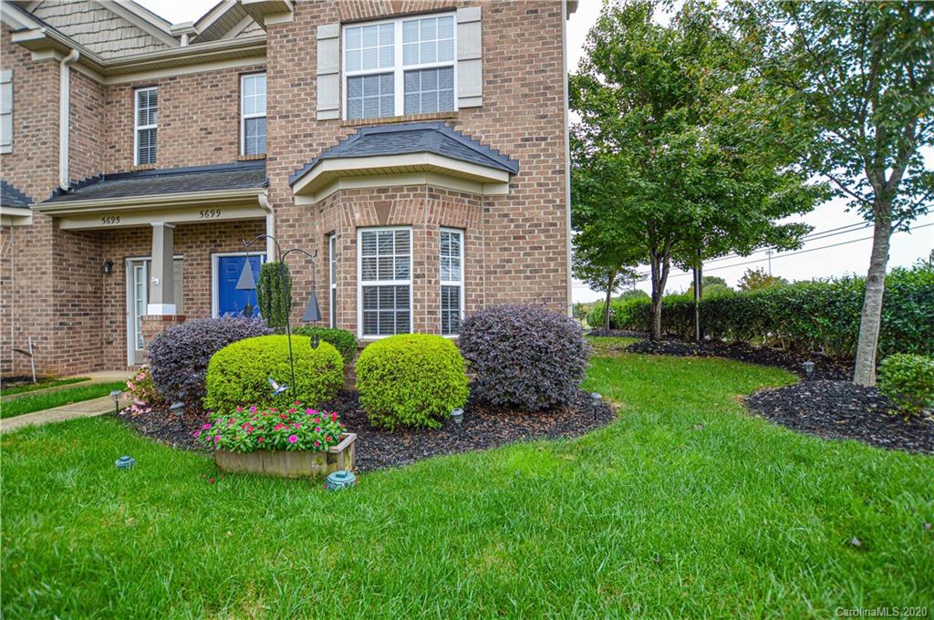 5699 Stafford Road Charlotte, NC 28215 - Photo 2 of 23 a front view of a house with garden