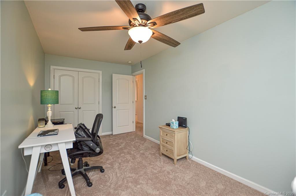 5699 Stafford Road Charlotte, NC 28215 - Photo 16 of 23 a workspace with furniture and a window