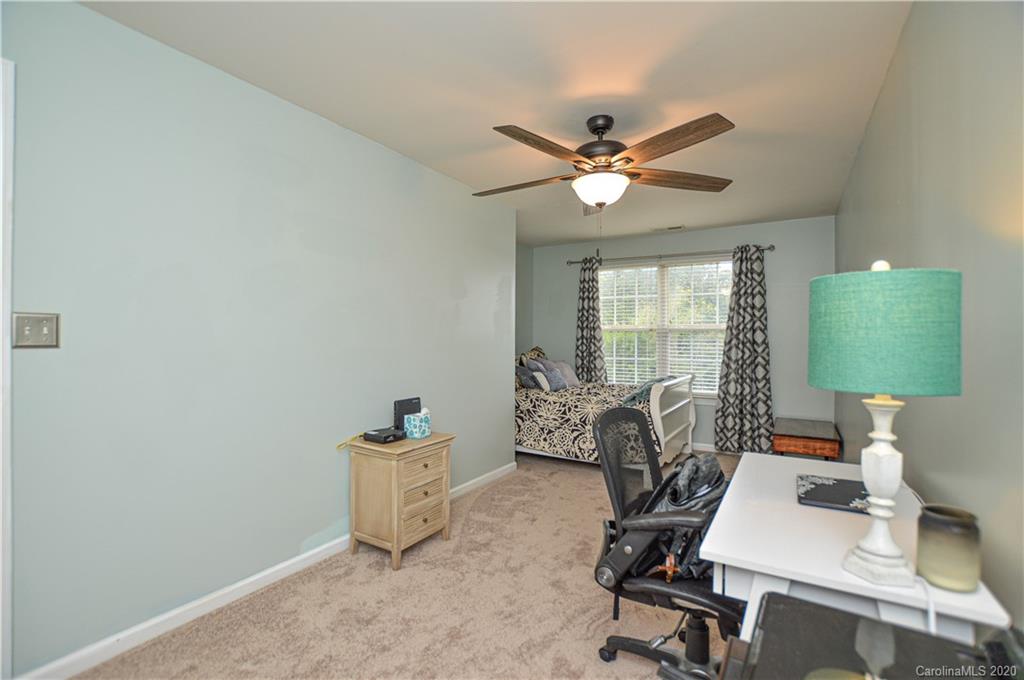 5699 Stafford Road Charlotte, NC 28215 - Photo 17 of 23 a view of a workspace with furniture and a window
