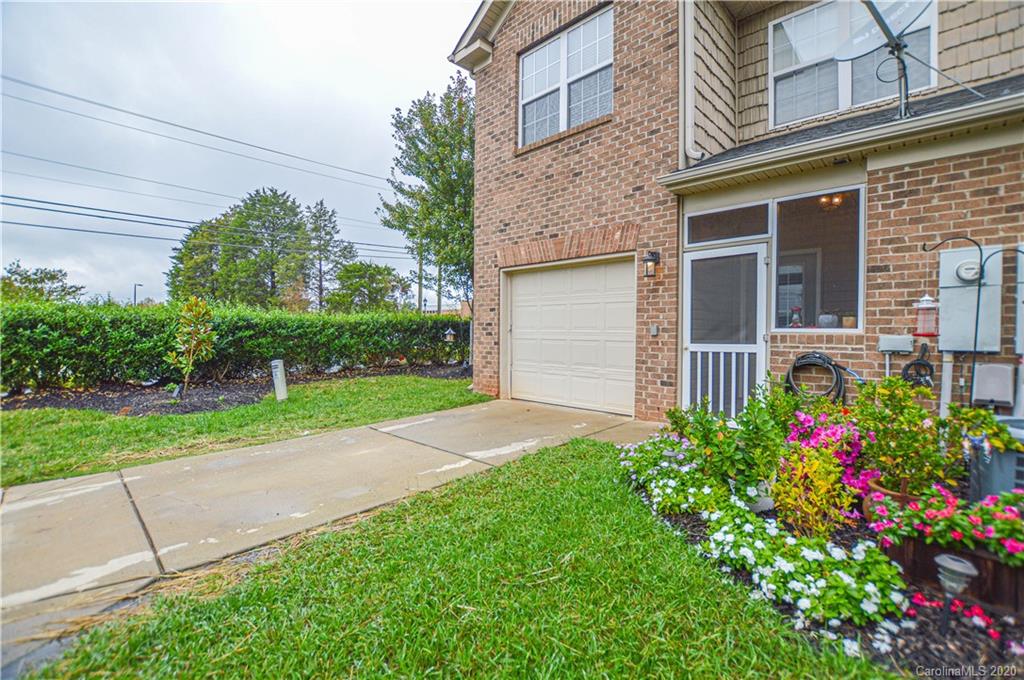 5699 Stafford Road Charlotte, NC 28215 - Photo 23 of 23 a view of a house with a yard and plants